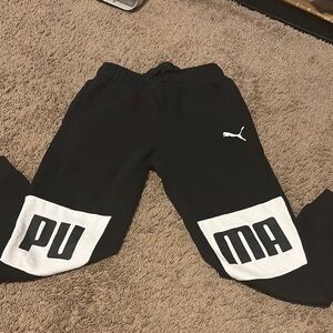 Puma Black and White Joggers with Bold P11 Design